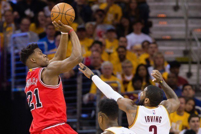 Jimmy Butley jumps above Kyrie Irving to score.