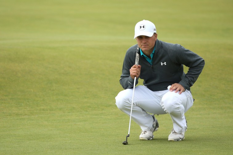 Jordan Spieth lines up a putt at The Open