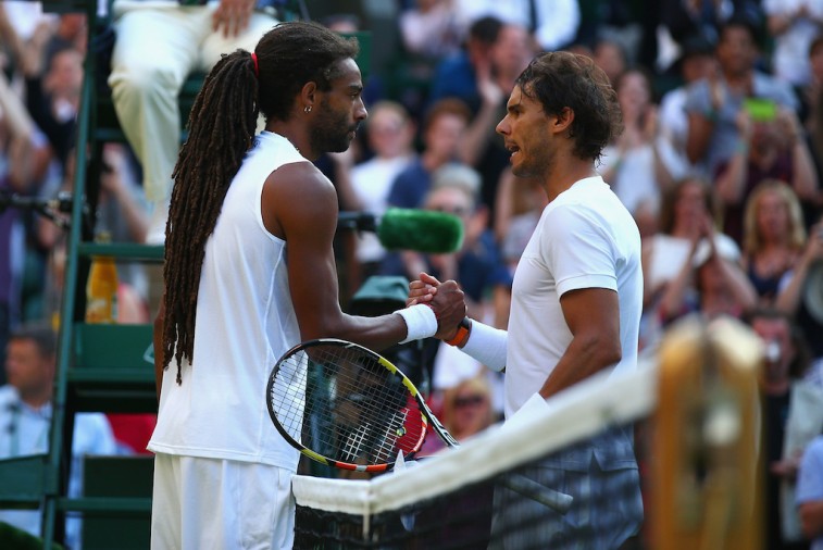Rafael Nadal shakes Dustin Brown's hand after Wimbledon loss