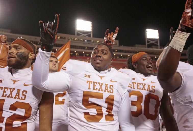 The Texas Longhorns celebrate after a victory