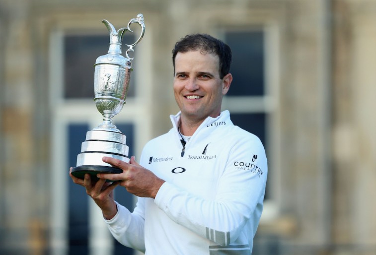 Zach Johnson holds the Claret Jug after winning The Open Championship