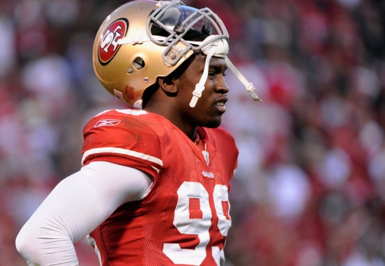 Aldon Smith looks on during a Divisional Playoff Game