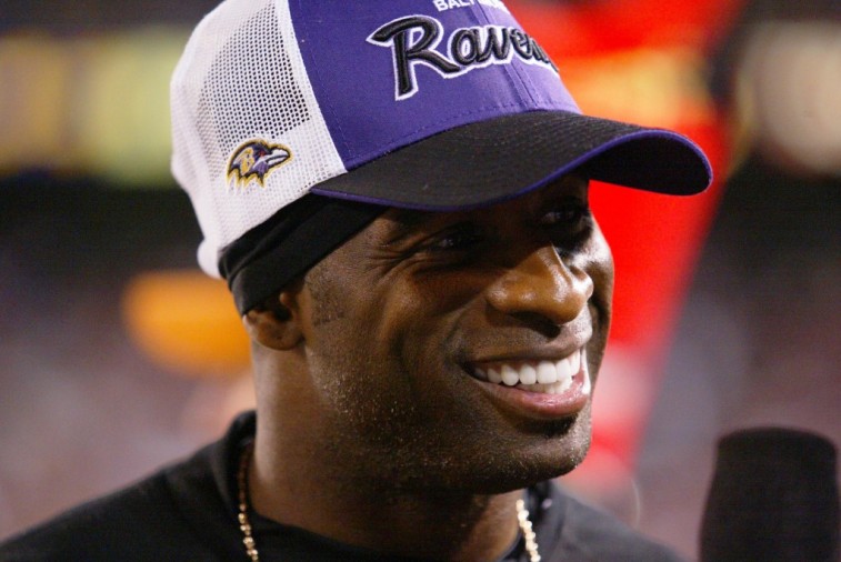 Deion Sanders on the sideline during a preseason game as a member of the Baltimore Ravens