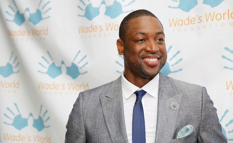 Dwyane Wade smiles during a charity event.