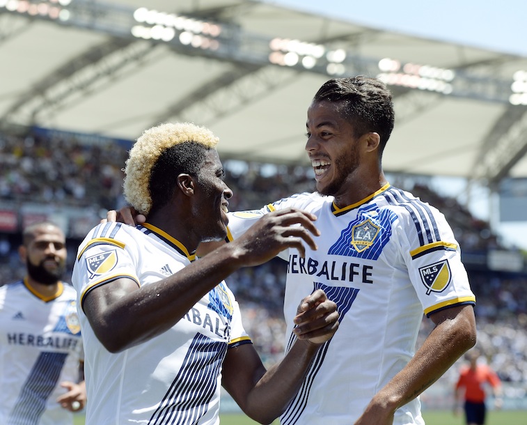 Giovani Dos Santos #10 of the Los Angeles Galaxy congratulates Gyasi Zardes #11 after he scored a goal