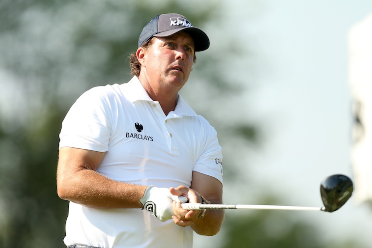 Phil Mickelson hits off during the third round of the World Golf Championships - Bridgestone Invitational