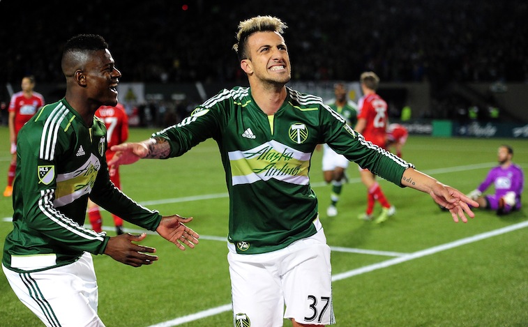 Maximiliano Urruti #37 of Portland Timbers celebrates with teammate Dairon Asprilla #11