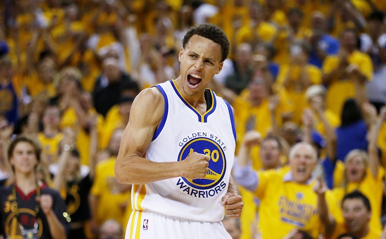 Stephen Curry celebrates in the NBA Finals