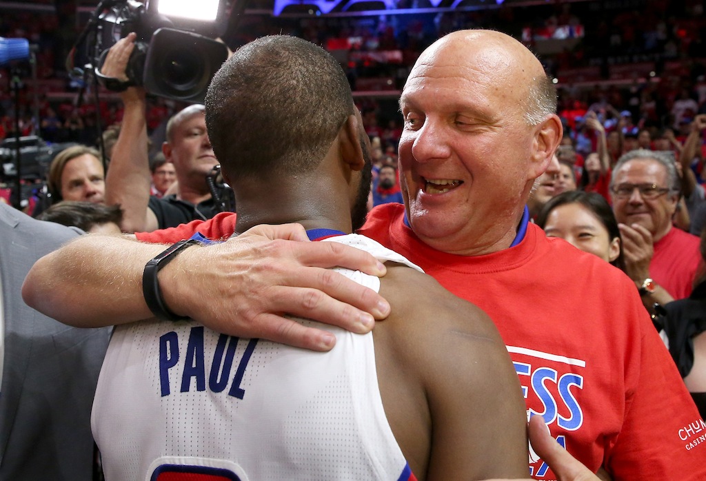 Chris Paul and Steve Ballmer embrace after the game