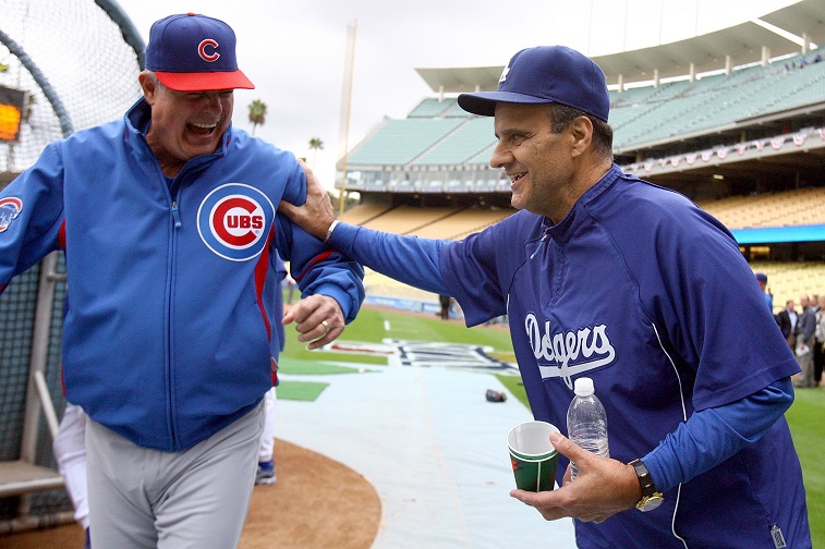 LOS ANGELES, CA - OCTOBER 04: Manager Lou Piniella of the Chicago Cubs talks with manager Joe Torre of the Los Angeles Dodgers before Game Three of the NLDS during the 2008 MLB playoffs on October 4, 2008 at Dodger Stadium in Los Angeles, California. The Dodgers defeated the Cubs 3-1 to advance to the NLCS.