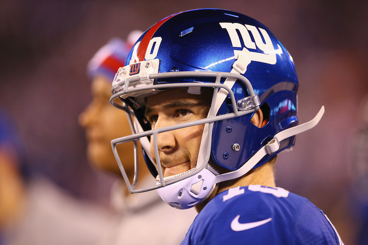 Eli Manning considers his options as the sideline.
