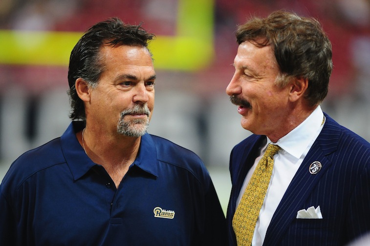 St. Louis Rams coach Jeff Fisher (L) speaks with team owner Stan Kroenke