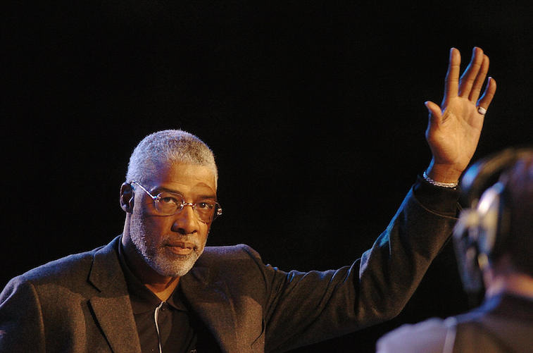 Julius Erving acknowledges applause from the public before competition during NBA All-Star Game