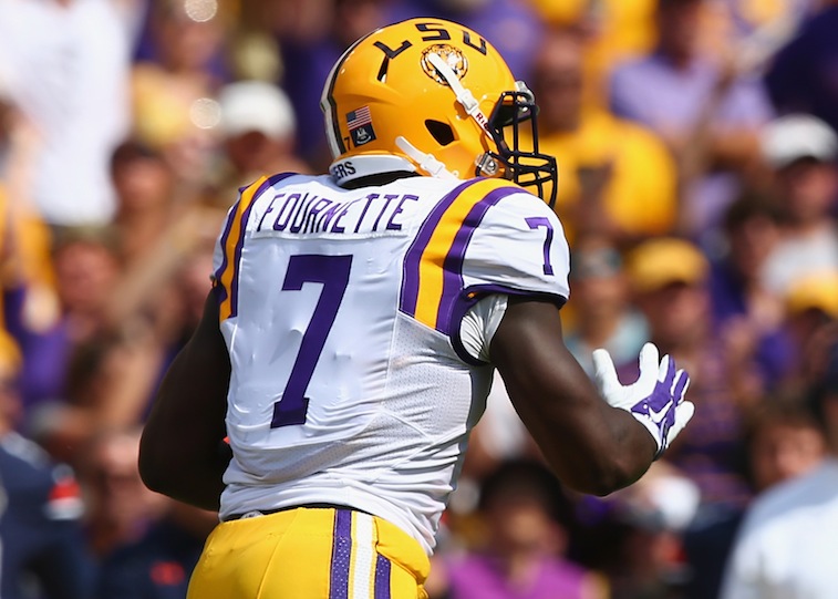 Leonard Fournette runs against Auburn