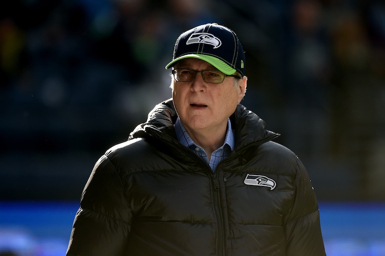 Seattle Seahawks owner Paul Allen walks on the field prior to kickoff