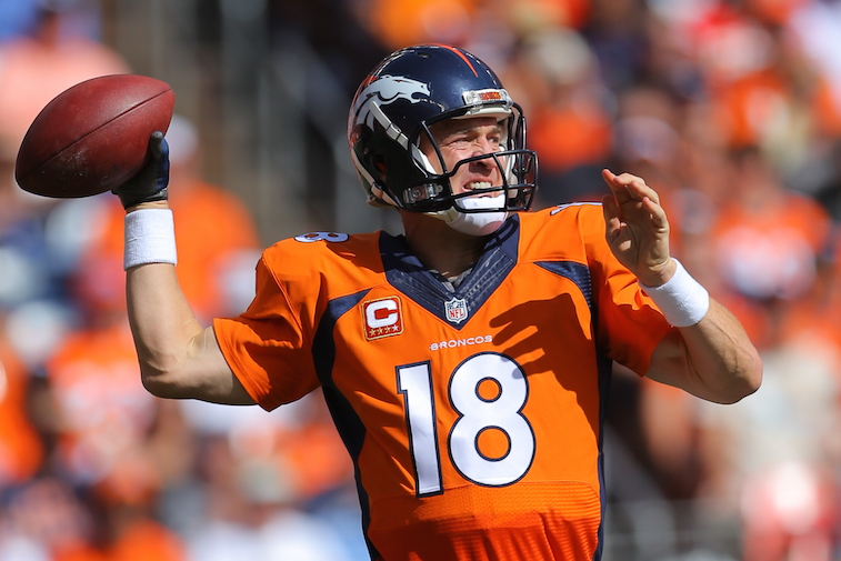 DENVER, CO - SEPTEMBER 14: Quarterback Peyton Manning #18 of the Denver Broncos throws in the first quarter of a game against the Kansas City Chiefs at Sports Authority Field at Mile High on September 14, 2014 in Denver, Colorado. (Photo by Justin Edmonds/Getty Images)
