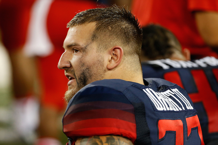 Scooby Wright III on the sidelines during a game against UTSA