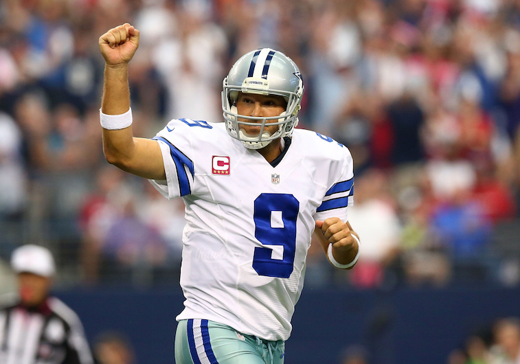 Tony Romo celebrates a touchdown pass