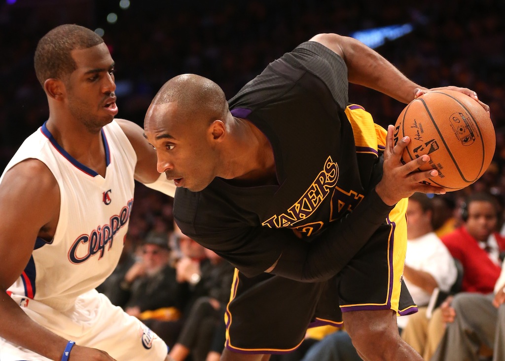 Chris Paul tries to guard Kobe Bryant