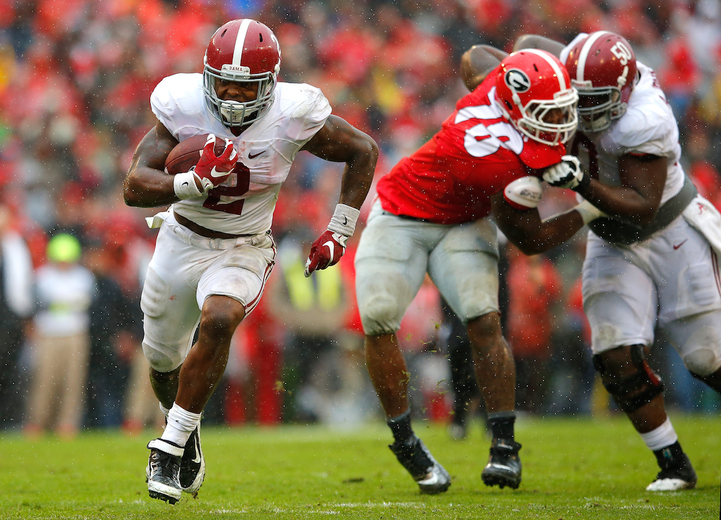 Derrick Henry (#2) runs against Georgia