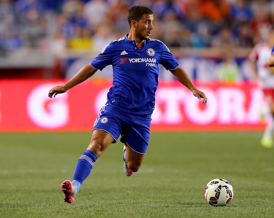 Eden Hazard dribbles the ball for Chelsea