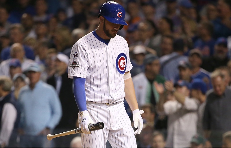 Kris Bryant strikes out and heads back to the dugout.
