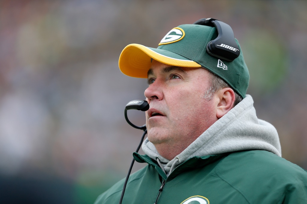 Mike McCarthy coaches during the Divisional Playoffs