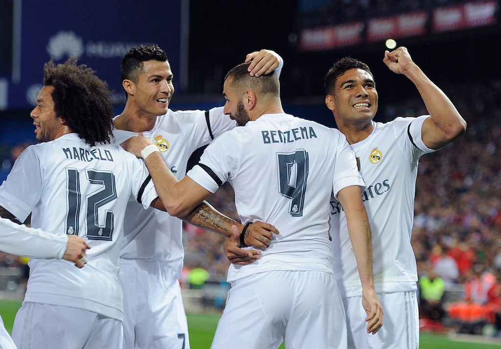 Real Madrid players celebrate a goal