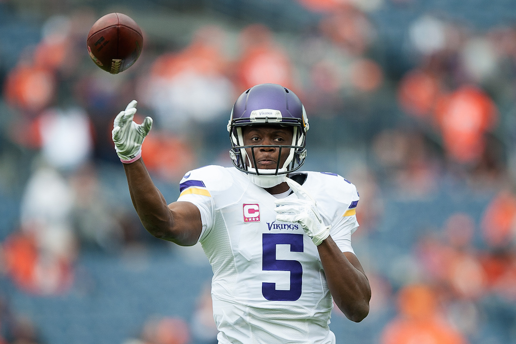DENVER, CO - OCTOBER 4: Quarterback Teddy Bridgewater #5 of the Minnesota Vikings throws as he warms up before a game against the Denver Broncos at Sports Authority Field at Mile High on October 4, 2015 in Denver, Colorado. (Photo by Dustin Bradford/Getty Images)