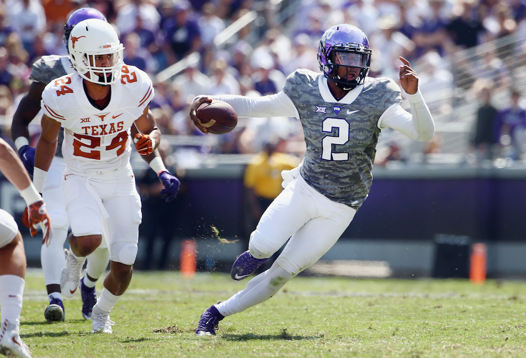 Trevone Boykin (#2) runs against Texas