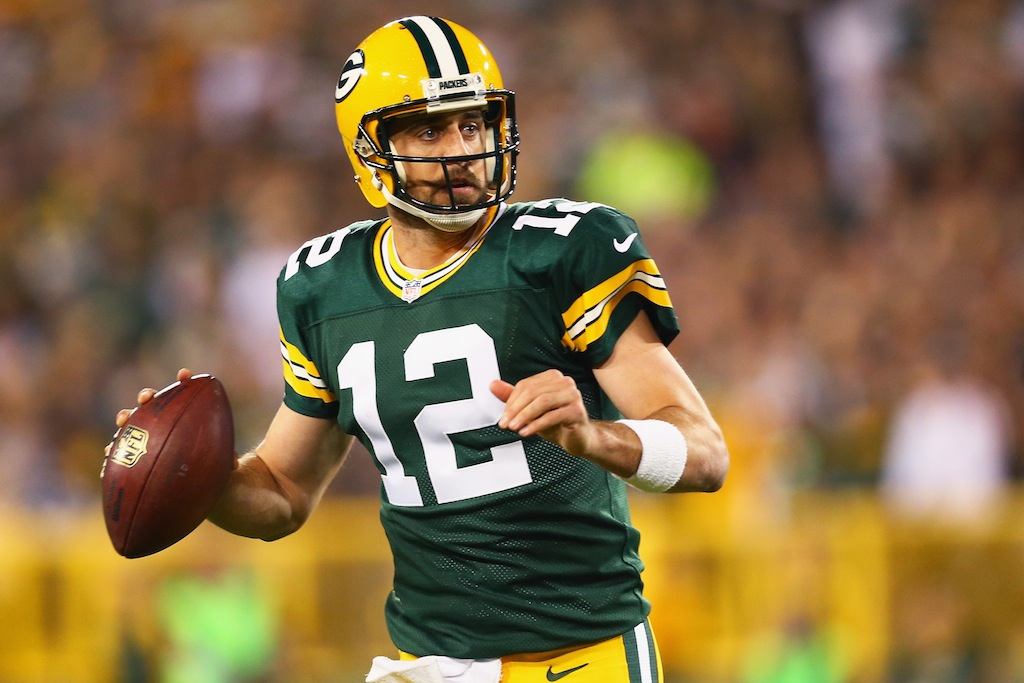Aaron Rodgers looks to throw against the Seahawks