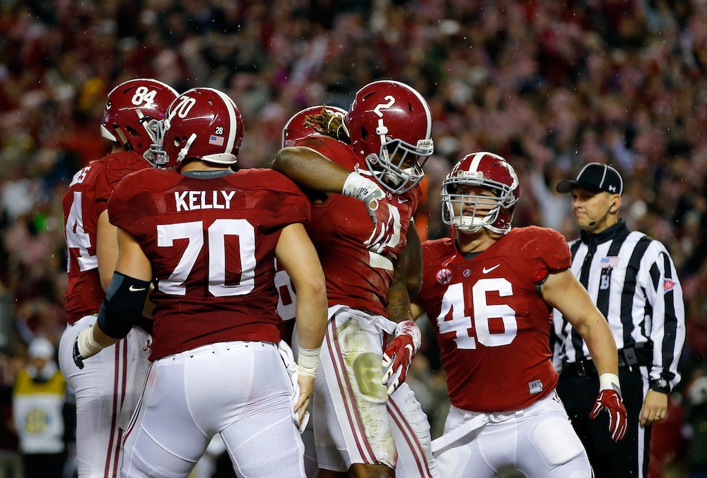 Alabama players celebrate a touchdown