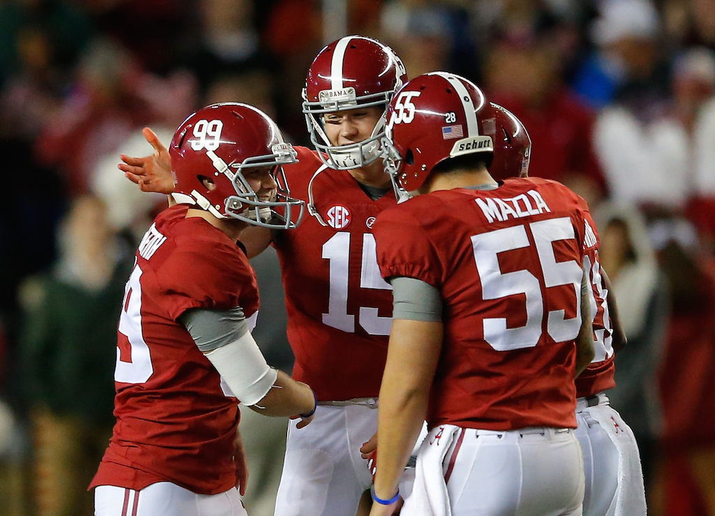 Alabama players celebrate a field goal