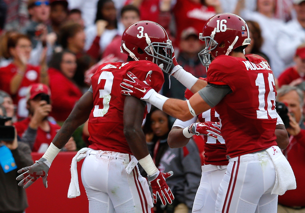Alabama players celebrate a touchdown