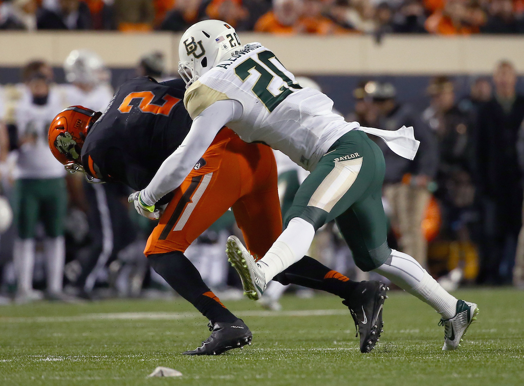 Oklahoma State QB Mason Rudolph #2 is sacked