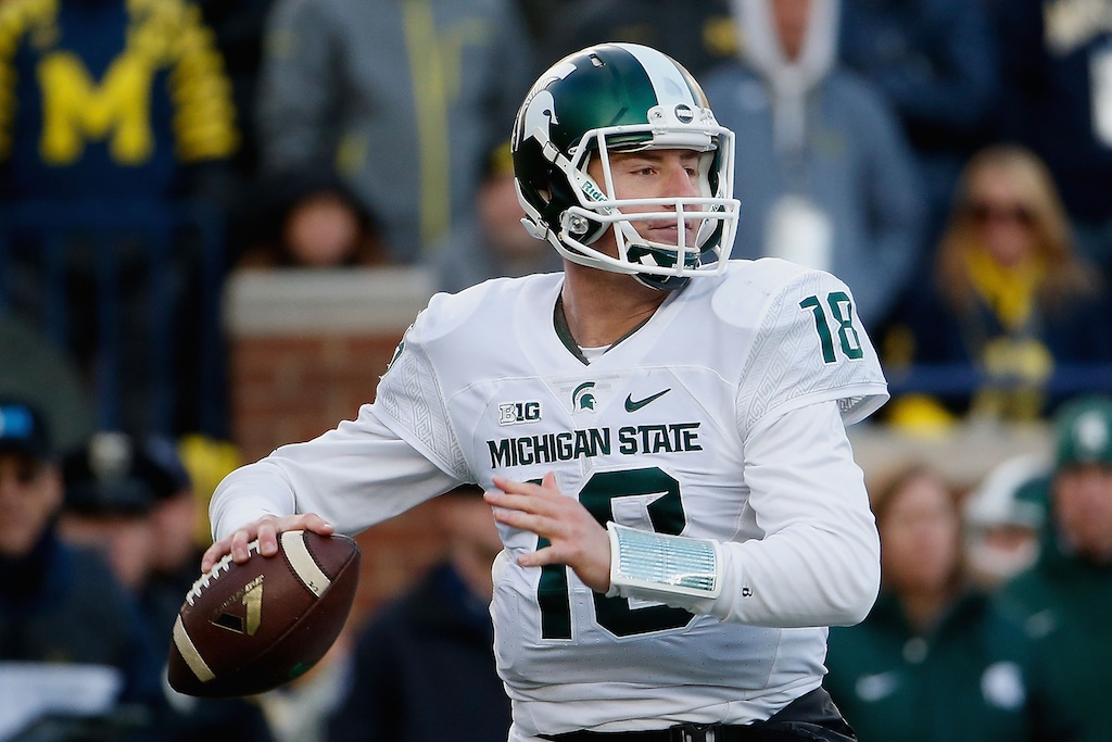 Connor Cook looks to pass