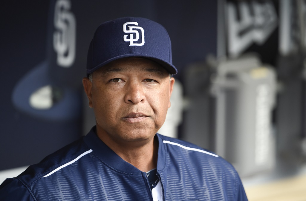 SAN DIEGO, CA - JUNE 15: Interim manager Dave Roberts #8 of the San Diego Padres looks on before a baseball game against the Oakland Athletics at Petco Park June 15, 2015 in San Diego, California.