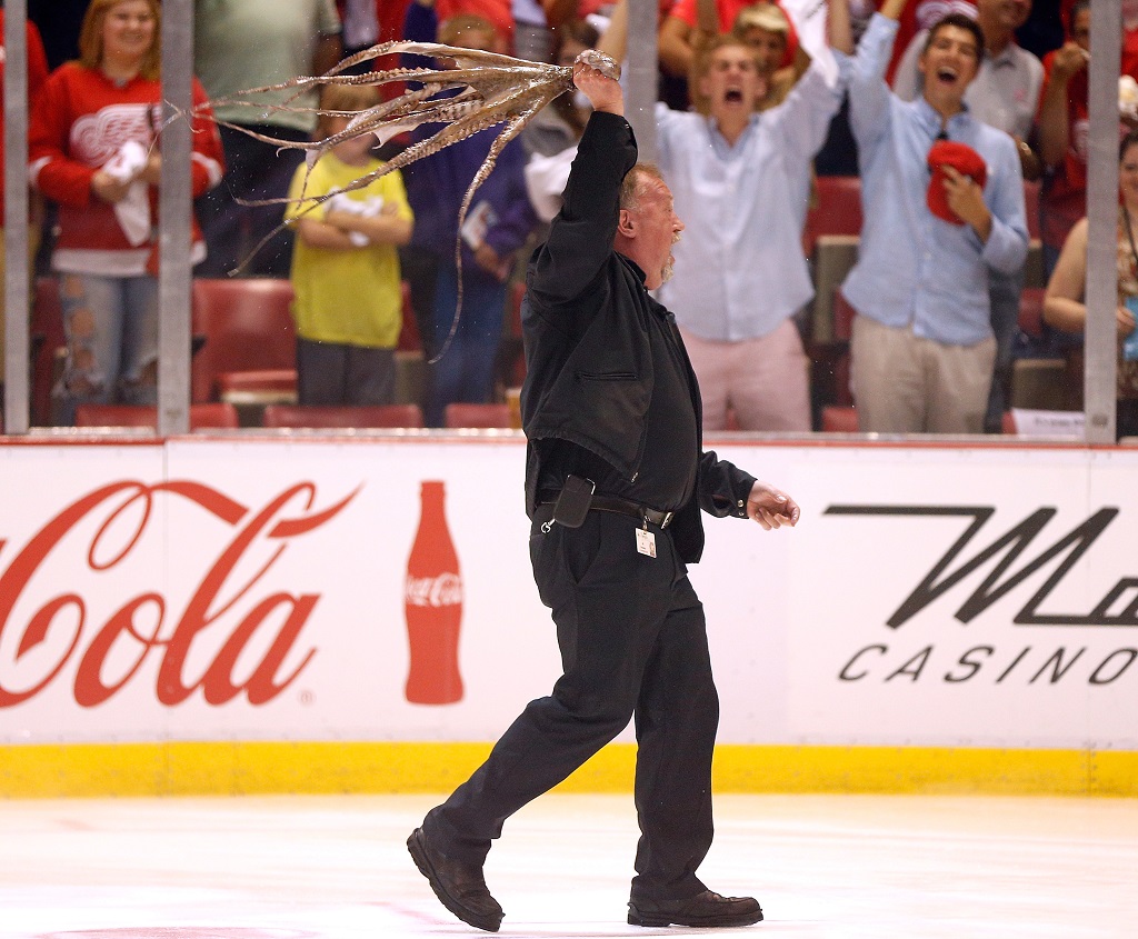 DETROIT, MI - MAY 20: Al Sobotka of the Detroit Red Wings gets the crowd going by spinning an octopus over his head prior to the Detroit Red Wings playing the Chicago Blackhawks in Game Three of the Western Conference Semifinals during the 2013 NHL Stanley Cup Playoffs at Joe Louis Arena on May 20, 2013 in Detroit, Michigan
