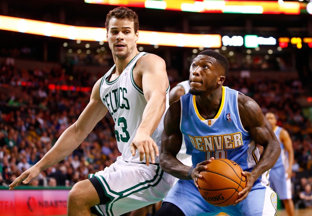 Nate Robinson of the Denver Nuggets looks to shoot