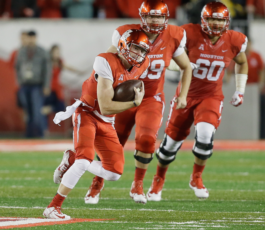 Kyle Postma #3 of the Houston Cougars scrambles out of the pocket