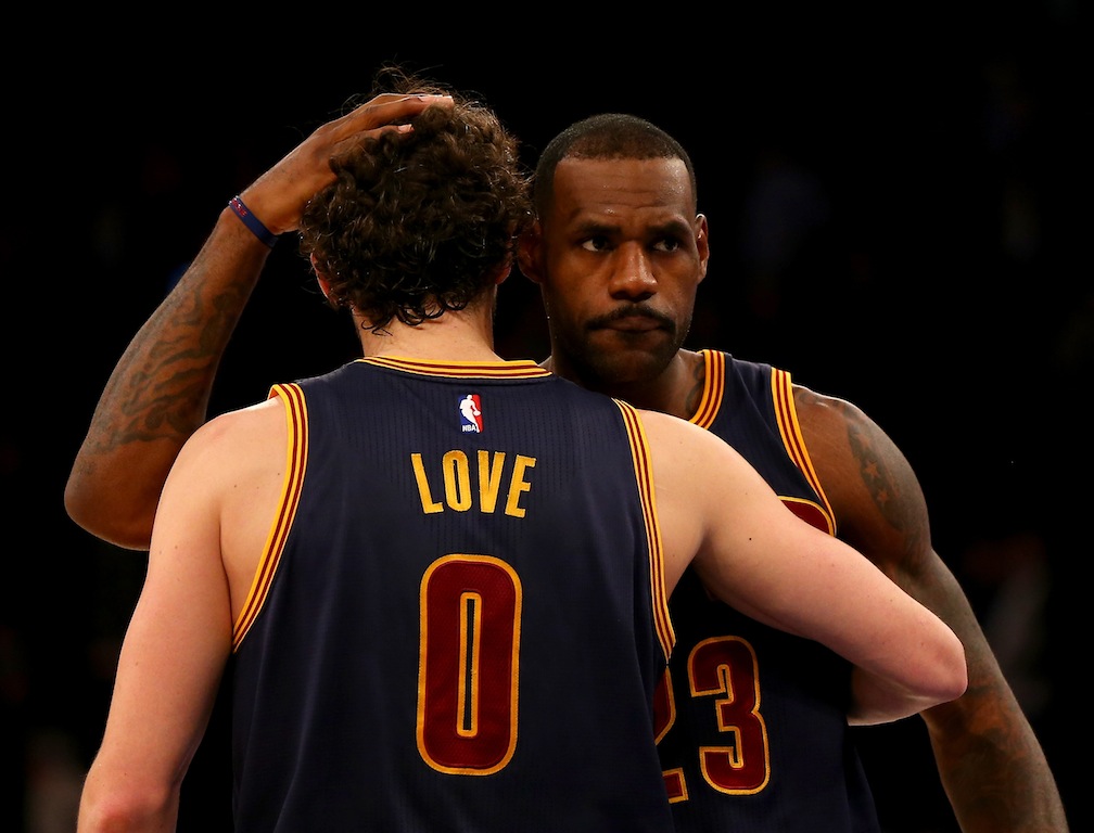 Kevin Love and LeBron James celebrate a win.
