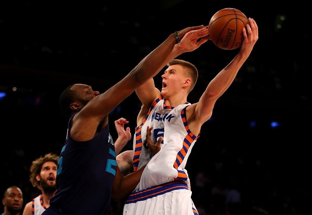 Kristaps Porzingis going up for a layup.