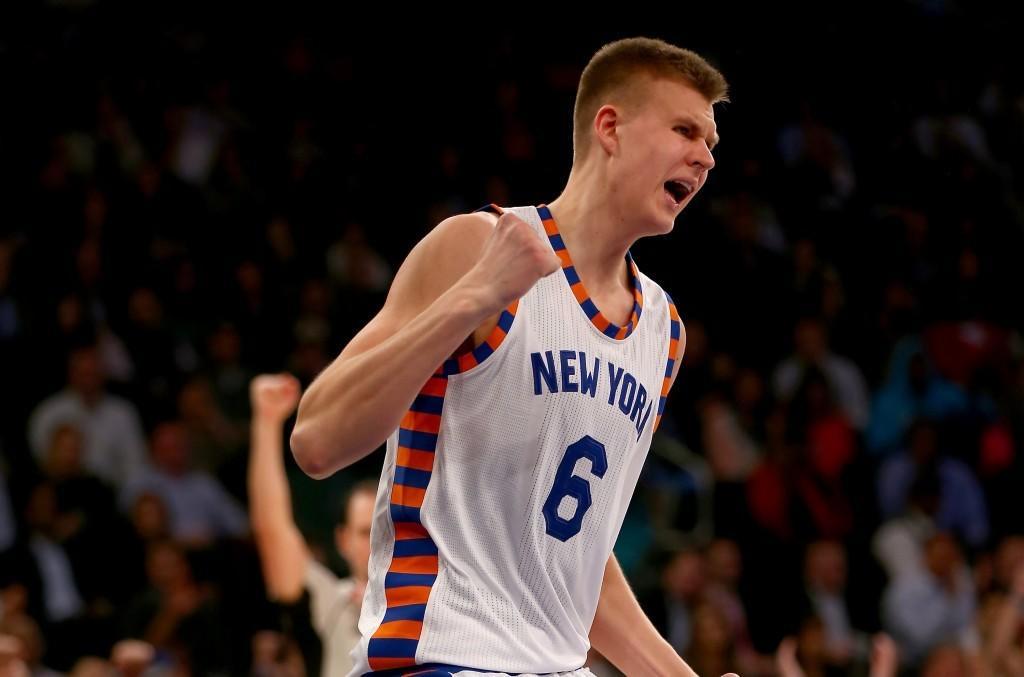 Kristaps Porzingis celebrates a victory for the New York Knicks.