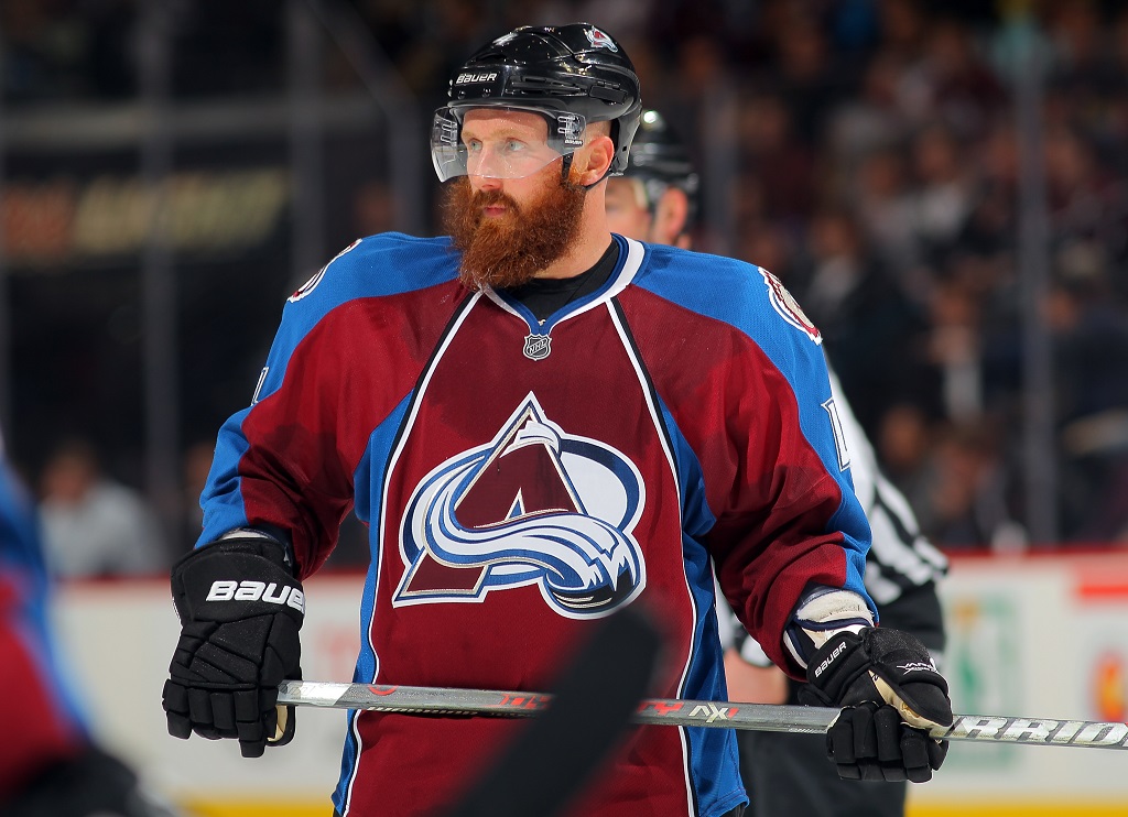 DENVER, CO - FEBRUARY 11: Greg Zanon #4 of the Colorado Avalanche looks on during a break in the action against the Phoenix Coyotes at the Pepsi Center on February 11, 2013 in Denver, Colorado. The Coyotes defeated the Avalanche 3-2 in overtime.