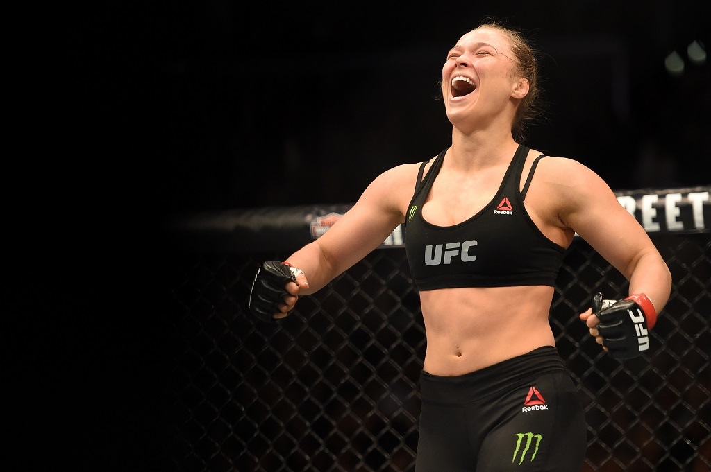 <> in their UFC women's bantamweight championship bout during the UFC 184 event at Staples Center on February 28, 2015 in Los Angeles, California.