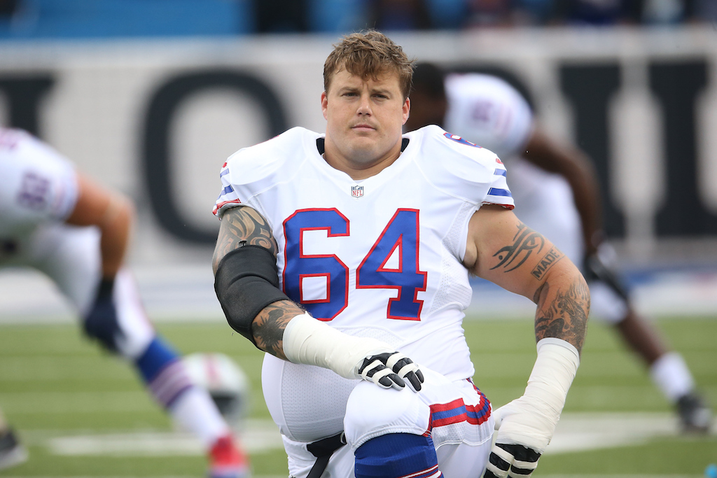 Richie Incognito takes a knee on the field