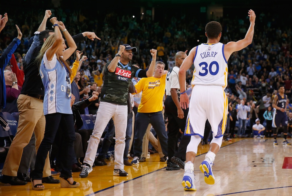 Golden State crowd cheers a Stephen Curry bucket
