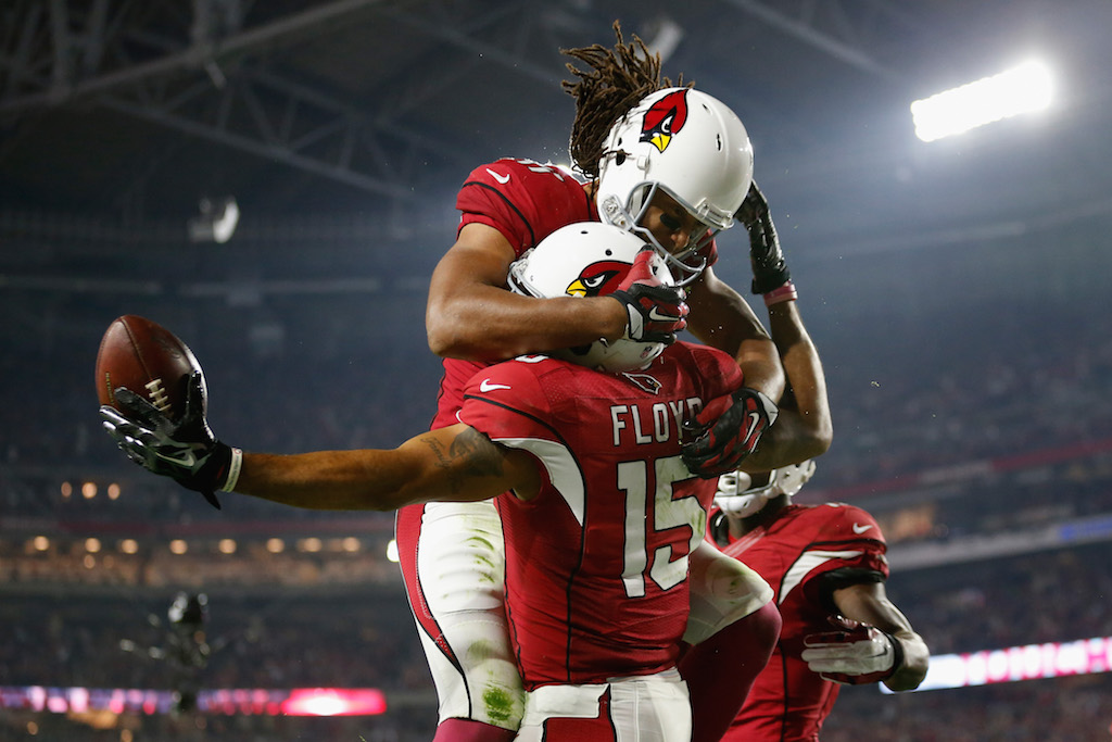 Larry Fitzgerald celebrates with Michael Floyd #15
