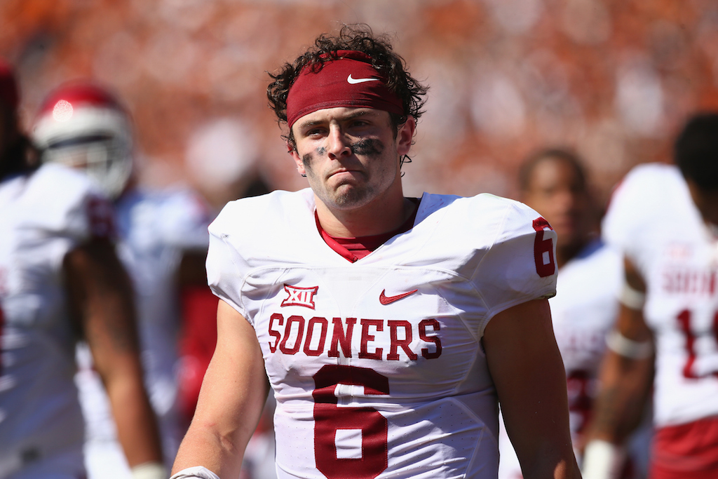Baker Mayfield of the Oklahoma Sooners walks off the field.