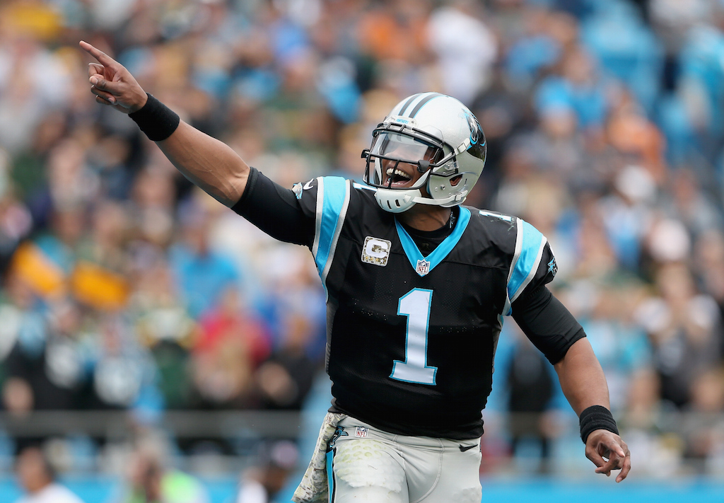 Cam Newton reacts during a game against the Packers